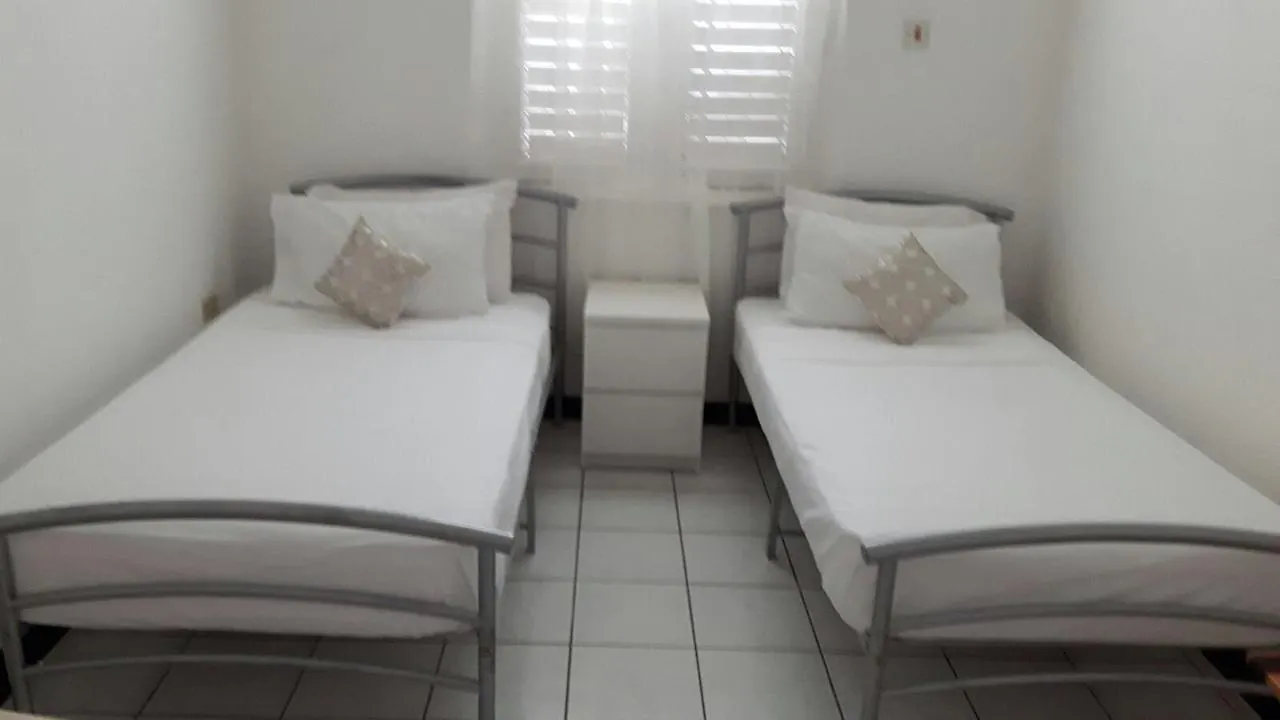 אוצ'ו ריוס Sandcastles Beach Resort מלון
